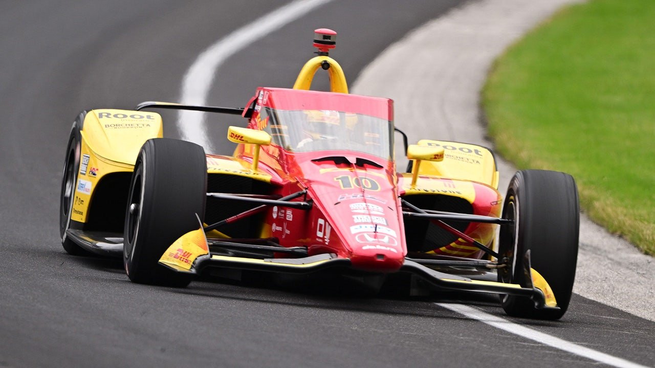 Alex Palou moves around Marcus Ericsson to win Indy 500