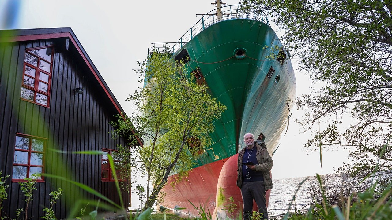 Norwegian man awakes to find 443-foot cargo vessel ran aground in his backyard