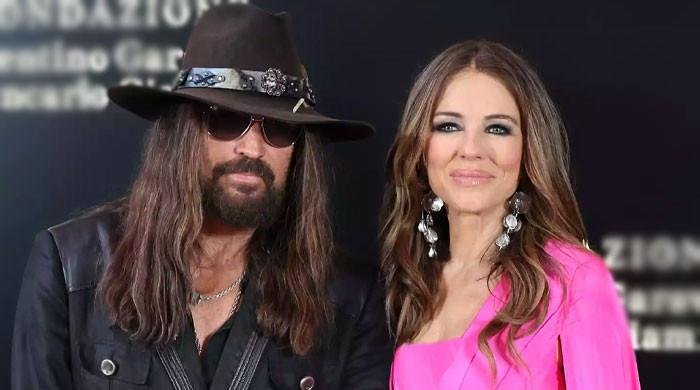 Billy Ray Cyrus makes red carpet debut with Elizabeth Hurley