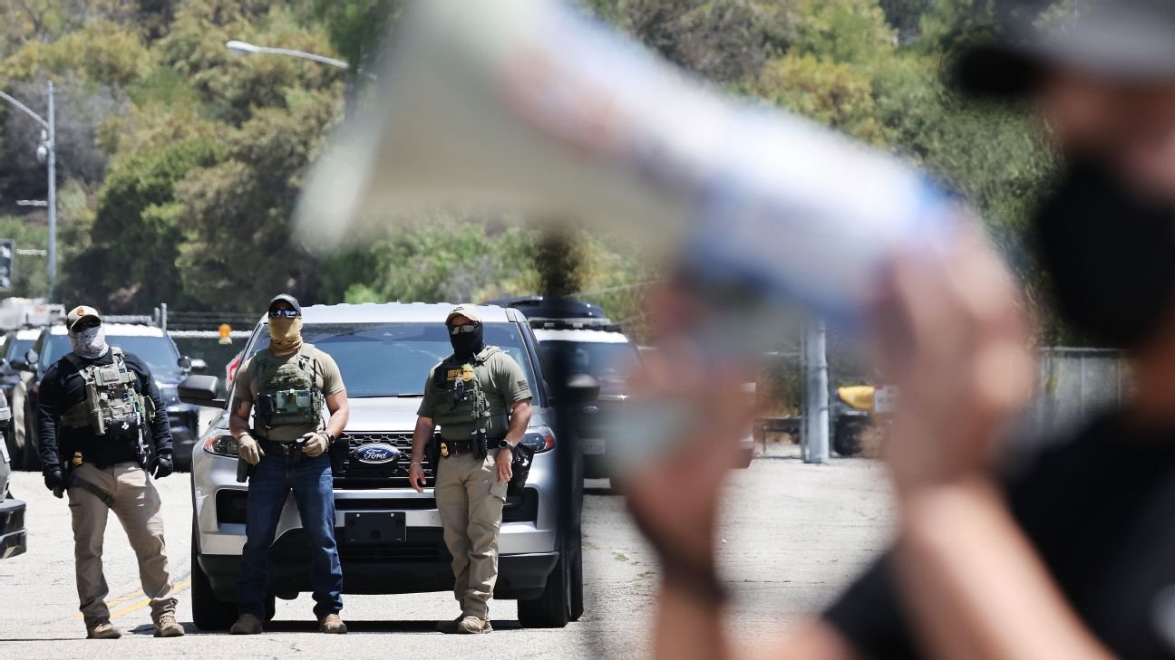 Dodgers said they asked federal agents to leave parking lot