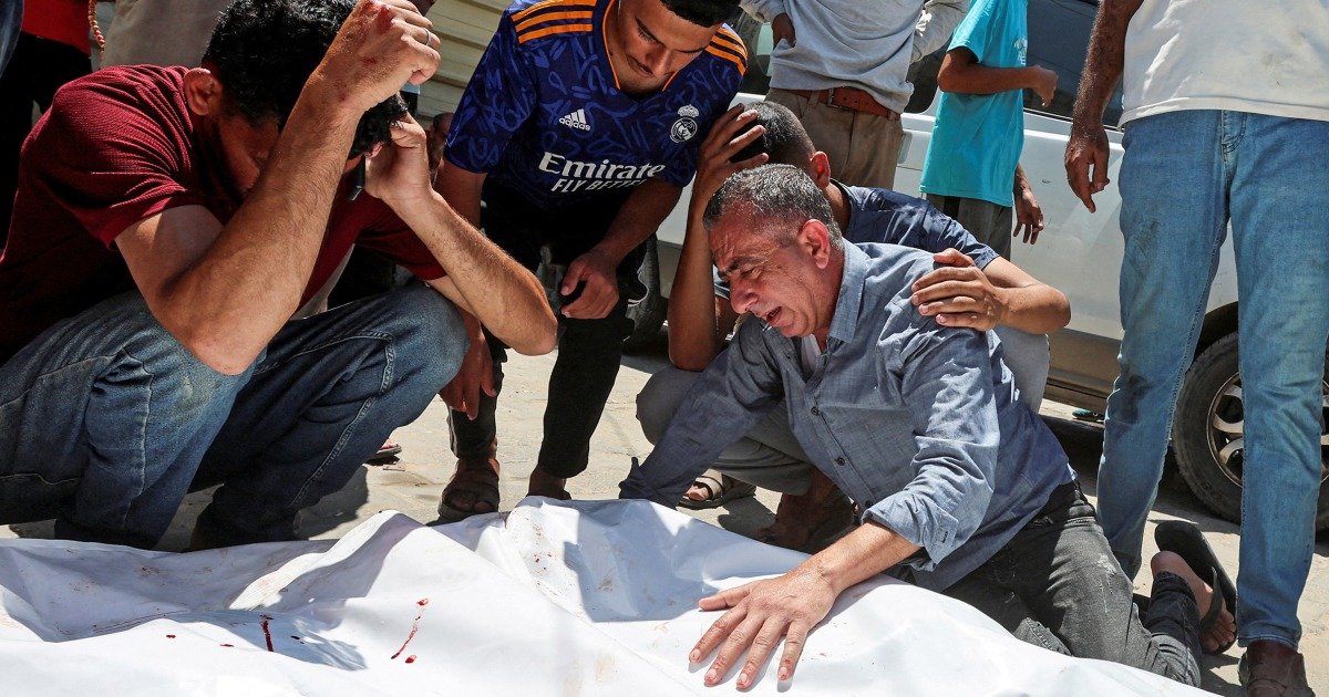 An Israeli strike kills 18 Palestinians in central Gaza as turmoil mounts over food distribution