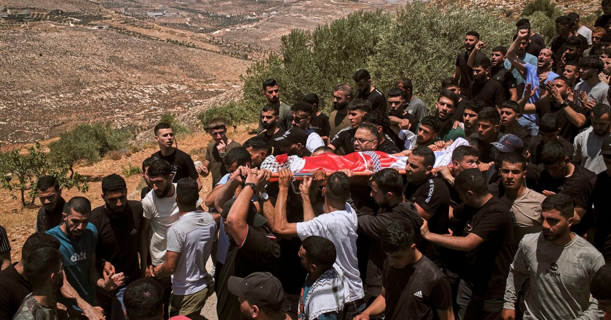 Israeli settlers rampage at a military base in the West Bank