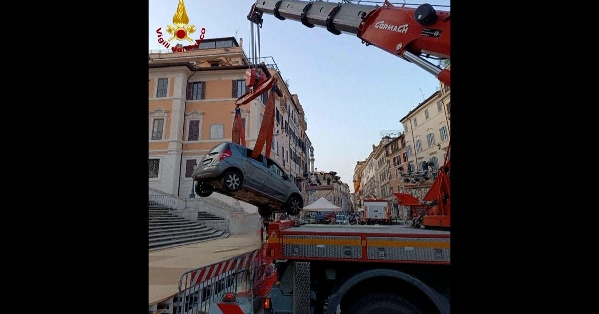 Video shows man driving car down Rome's Spanish Steps