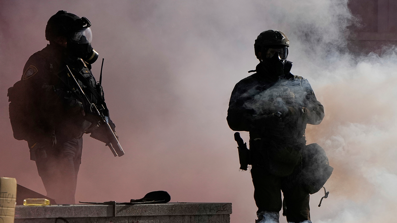 Multiple police officers injured in violent Portland riot at ICE facility