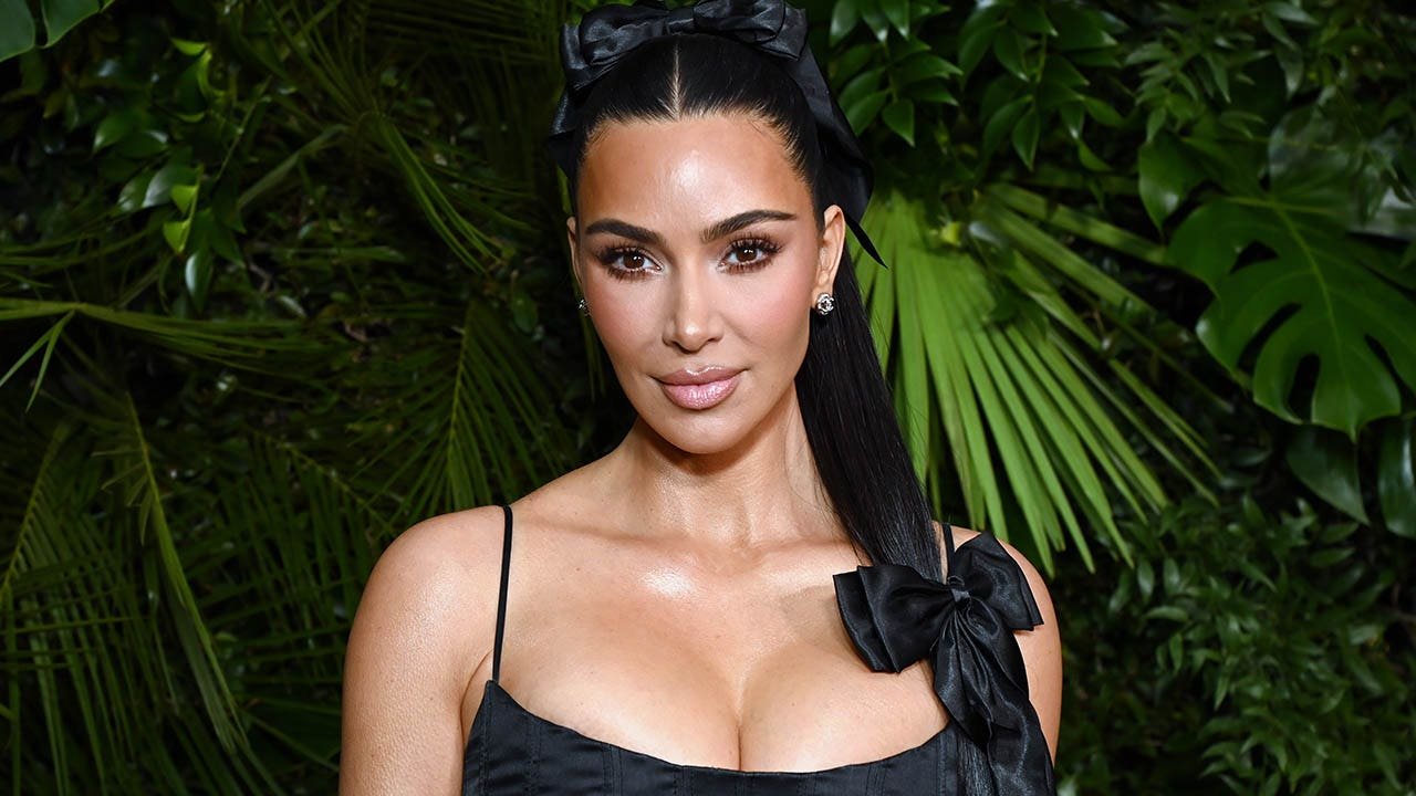 Kim Kardashian shares sultry bikini photos from inside her massive closet