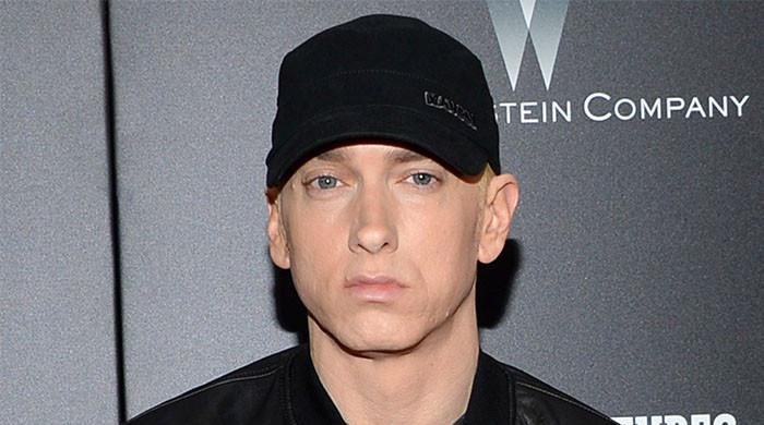 Eminem locks heads with Meta
