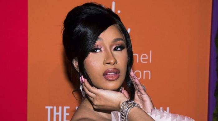 Cardi B reveals daughter Blossom’s face in new summer fun post
