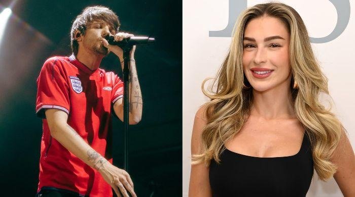 Louis Tomlinson, Zara McDermott 'steal moment' at Glastonbury festival