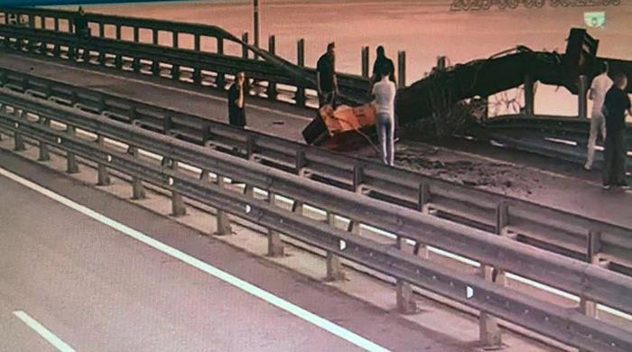 Ukraine says it hit Russia's bridge to Crimea with underwater explosives