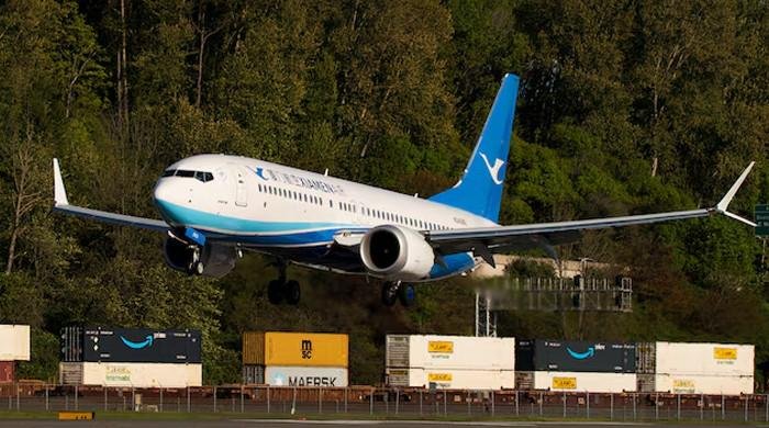 Boeing plane returns to China for delivery as tariff war eases
