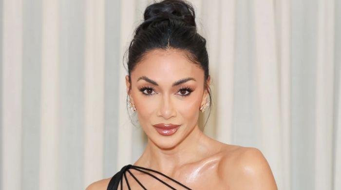 Nicole Scherzinger moved to tears while receiving her first Tony Award