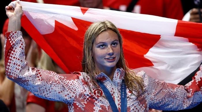 Canada's McIntosh breaks 400m medley world record