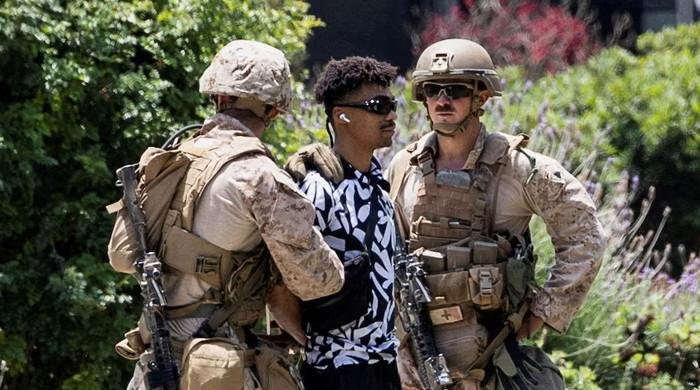 US Marines make first detention in LA as more protests expected