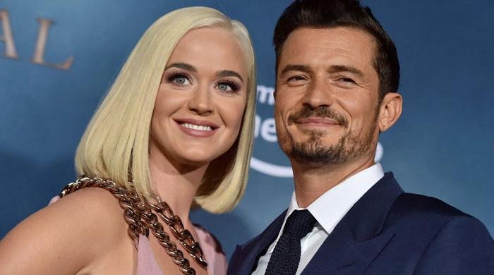 Orlando Bloom's mystery brunette companion identified amid Katy Perry split