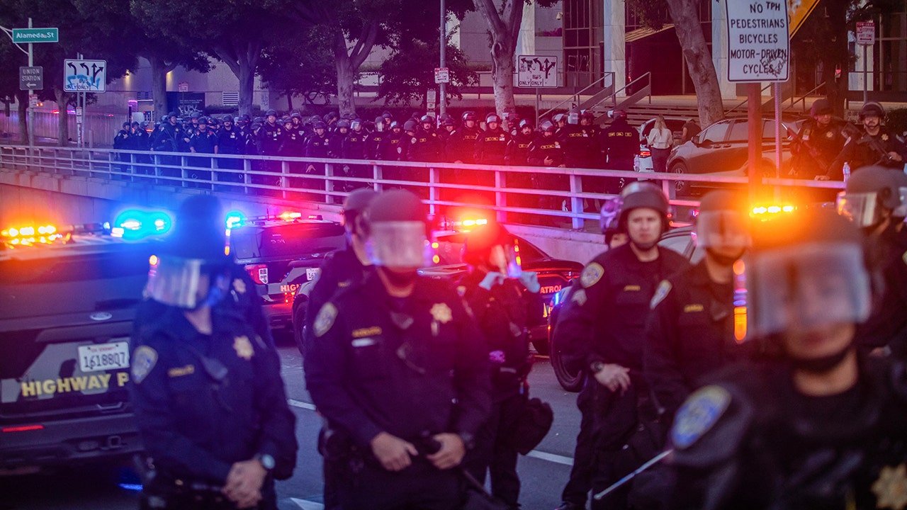 Protesters clash with police in violent downtown LA demonstrations