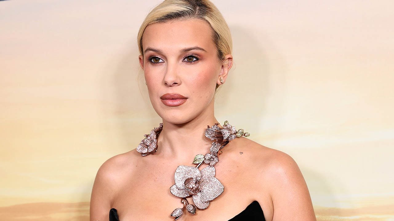 Millie Bobby Brown shows off toned and tanned physique in string bikini