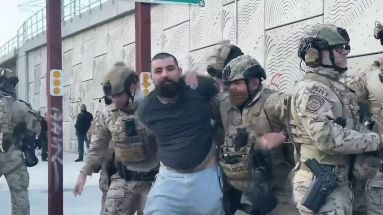 LA protester charged with assault after throwing rock at federal officer