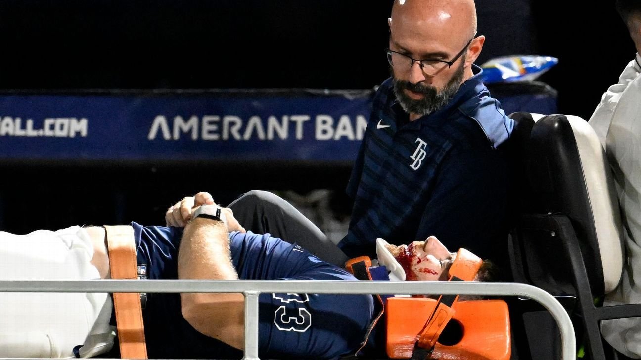 Rays pitcher carted off field after foul ball strikes him in dugout