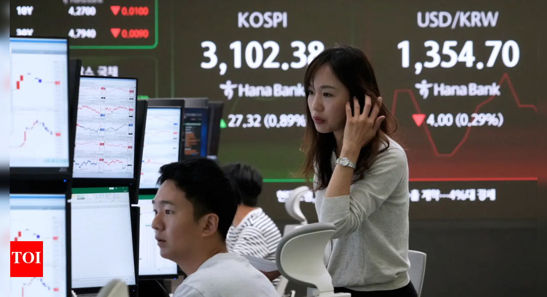 Asian equities mixed as Trump's tariff deadline looms; US jobs data surprises and Wall Street surges