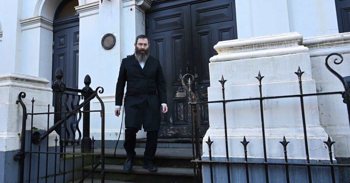 Congregation flees after arsonist sets fire to an Australian synagogue door