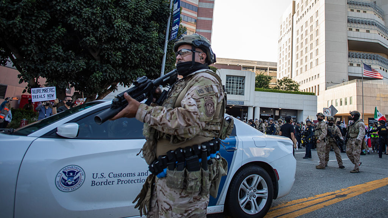 Arrests made in Los Angeles as anti-ICE protesters clash with police, military