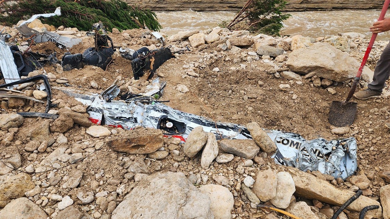 Harrowing pics show volunteer fire chief's vehicle after he was swept away in floods