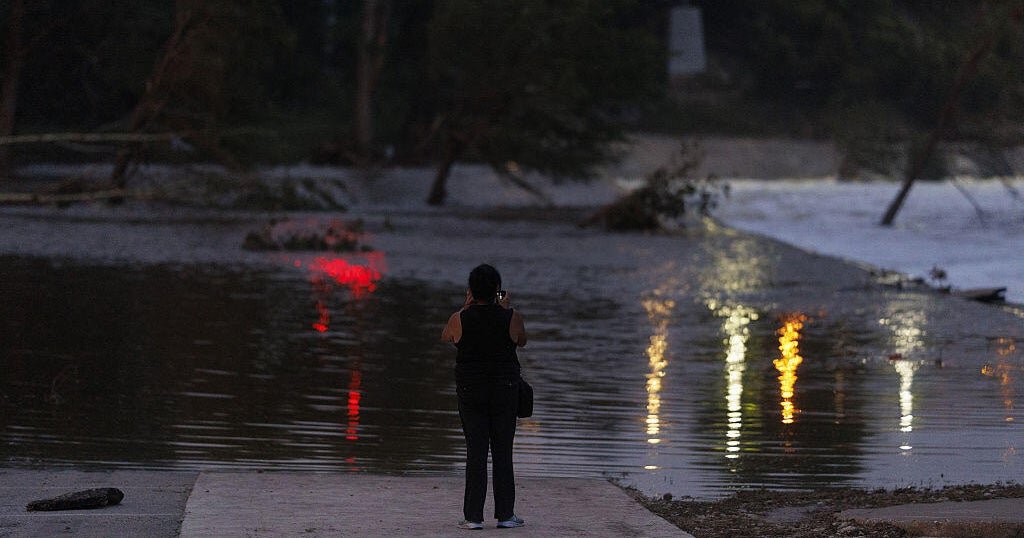 How much rain fell in Texas that caused the catastrophic flooding?