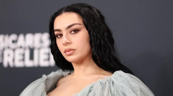 Charli XCX strikes back at Glastonbury criticism with quick nap: 'Yawn'