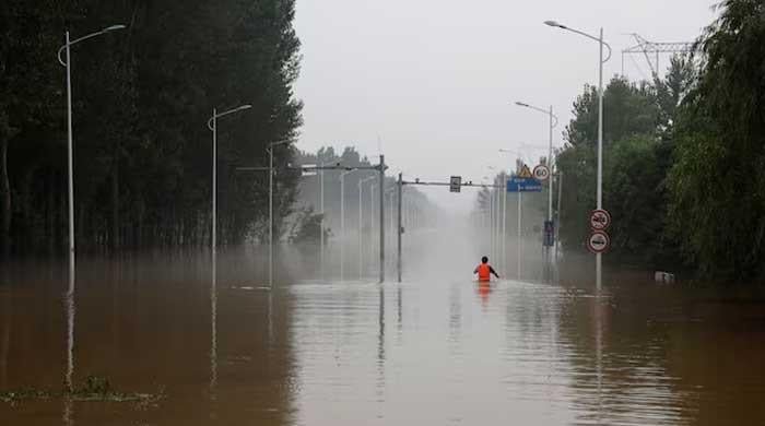 China's north and west on alert after sweeping rains trigger deadly floods