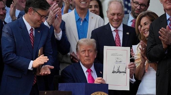 Trump signs signature tax-cut and spending bill into law