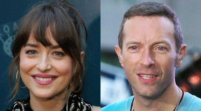Dakota Johnson moves on from Chris Martin during Ibiza trip