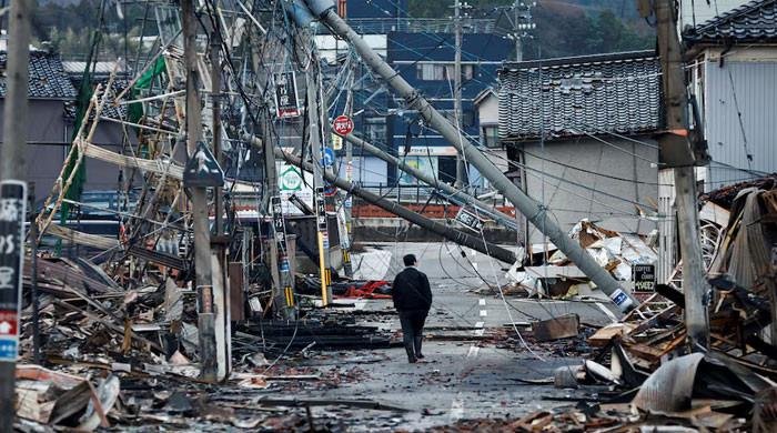 Japan braces for more quakes, authorities dismiss doomsday hype