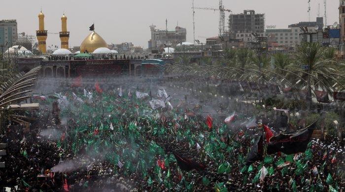 Mourners observe 10th Muharram with worldwide processions