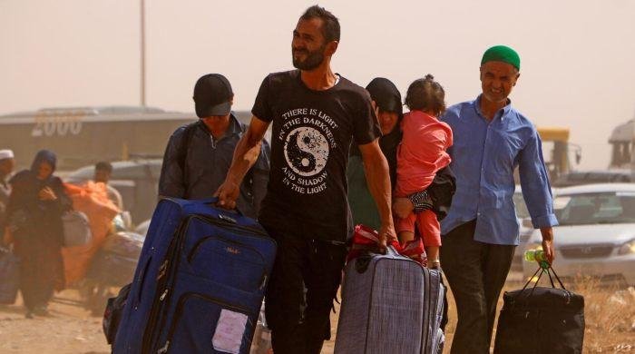 Nearly 450,000 Afghans left Iran since June 1: IOM